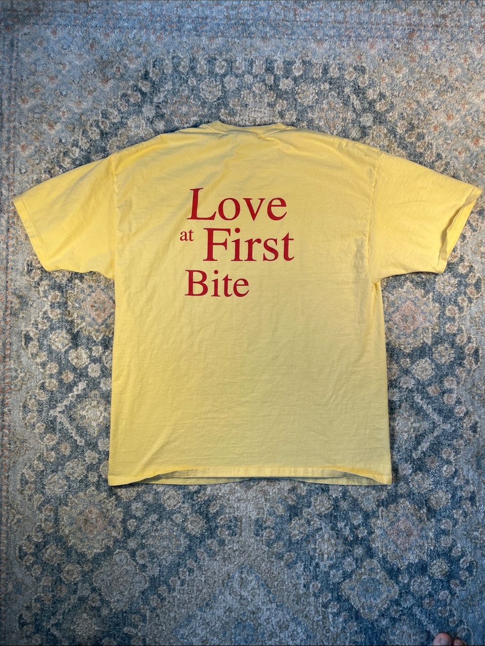 Port and Company Yellow Short Sleeve Tee with Tatro’s Logo “Love at first bite”